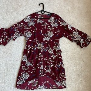 Maroon flowery dress.